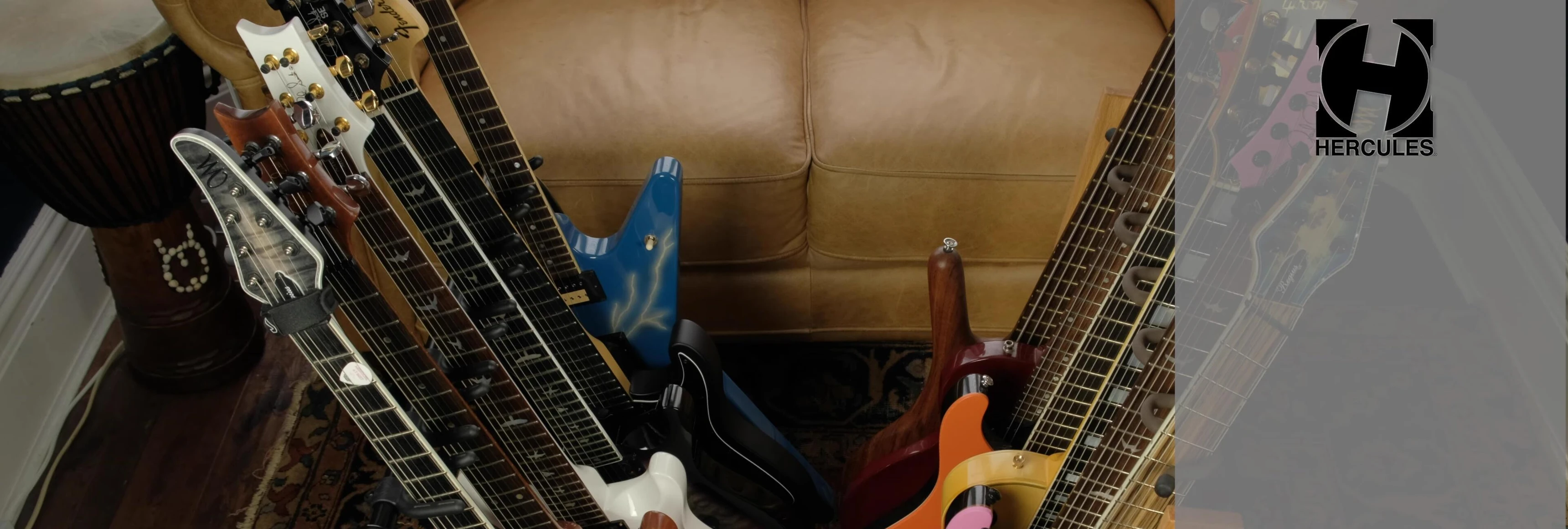 Shows how easily guitars can be placed and removed from the Hercules rack due to its design.