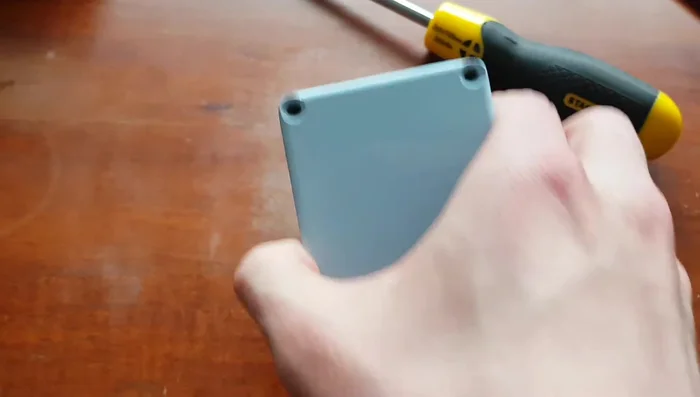 Attempt to pull the battery out with your hands. If it's stuck, proceed to the next step.