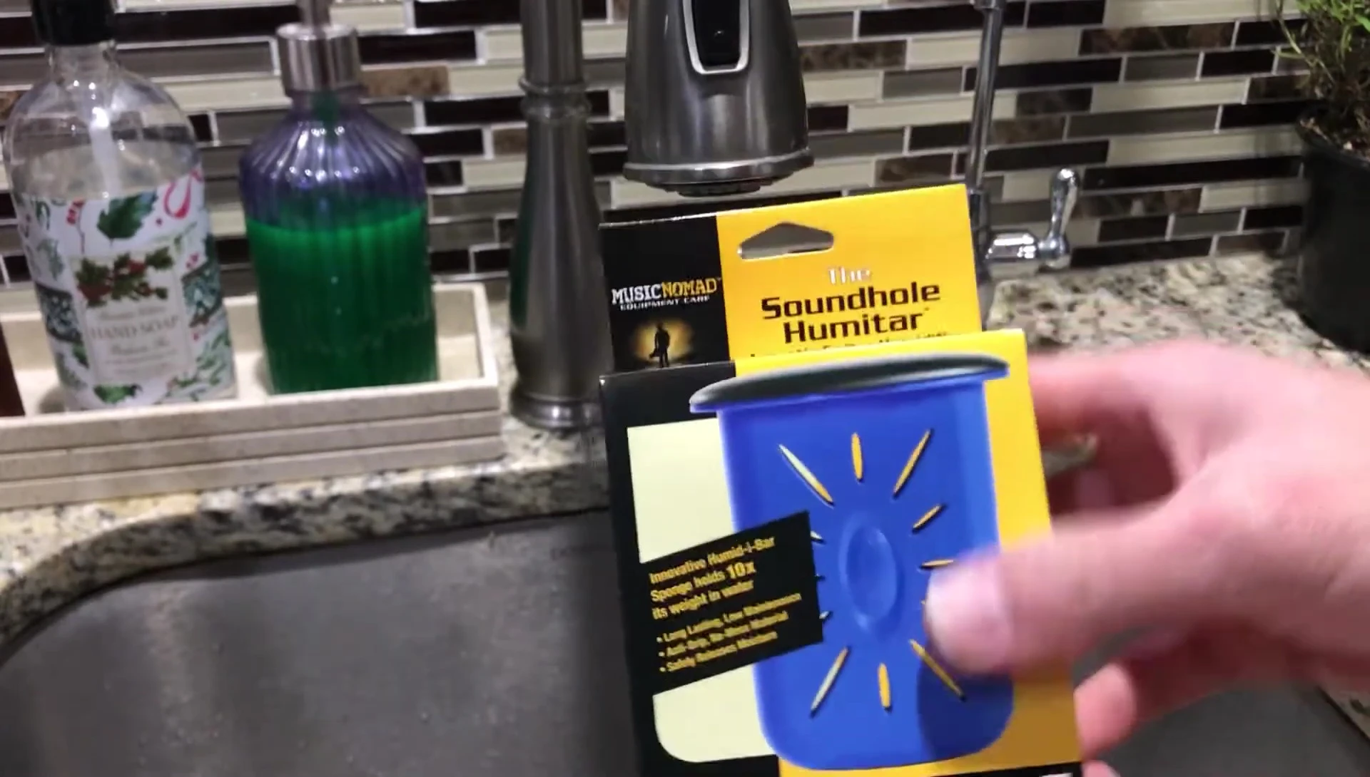 Close-up of the MN300 Humitar packaging being opened