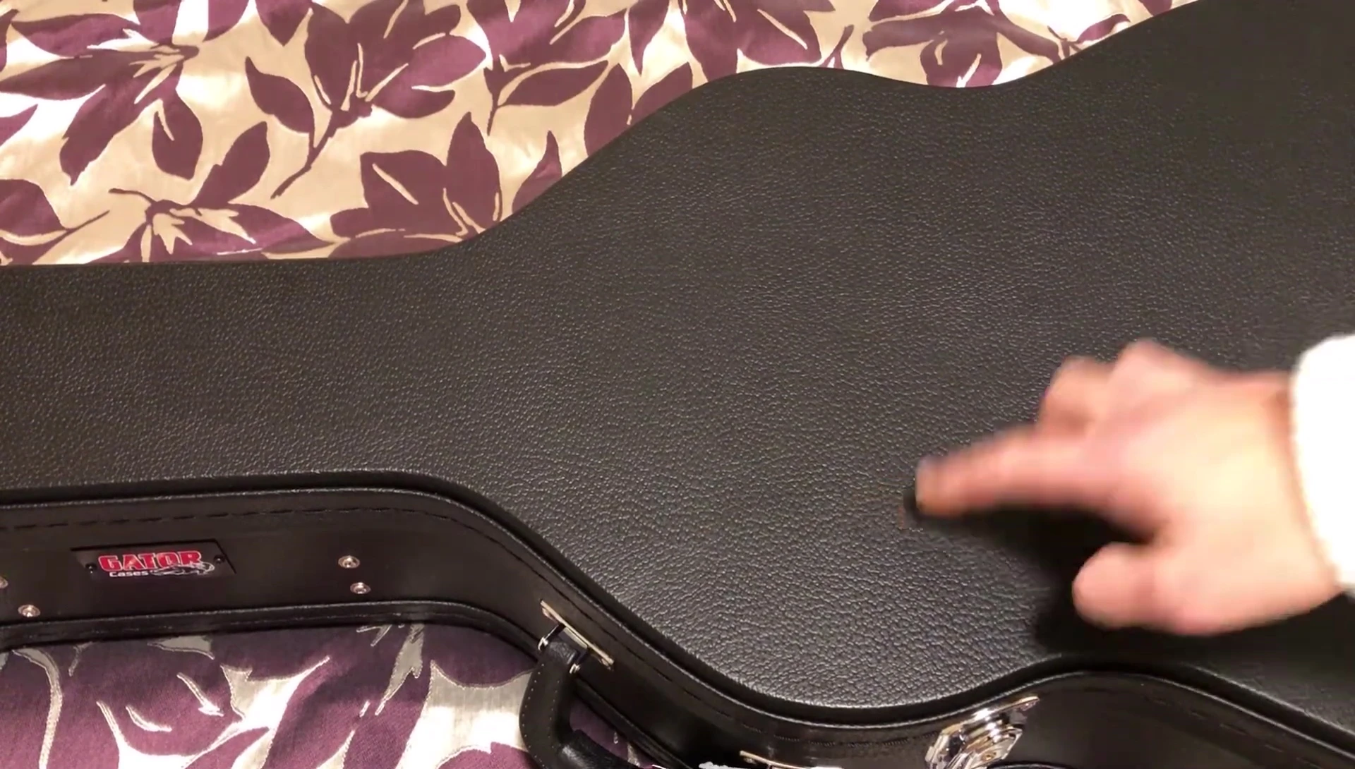 The Humitar in its hard-shell case