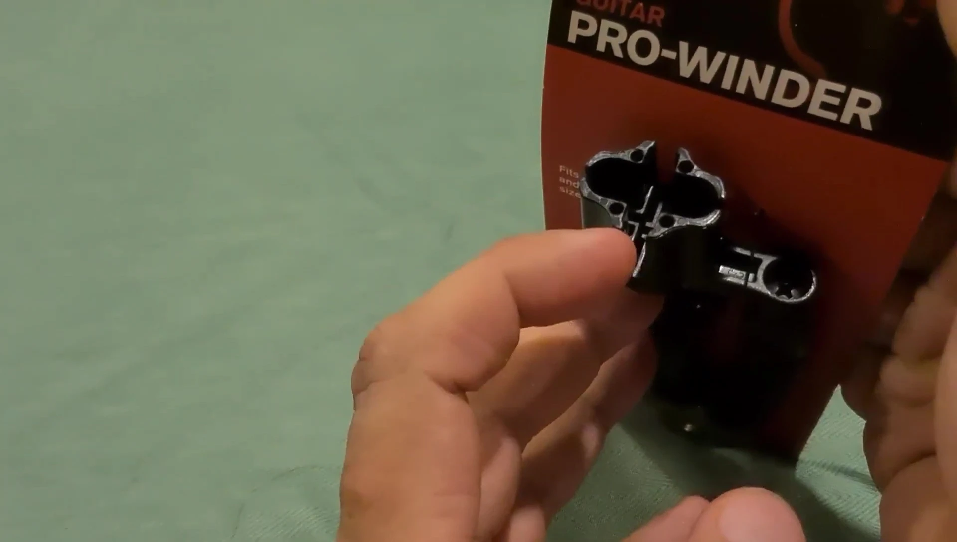Hand holding the Pro Winder