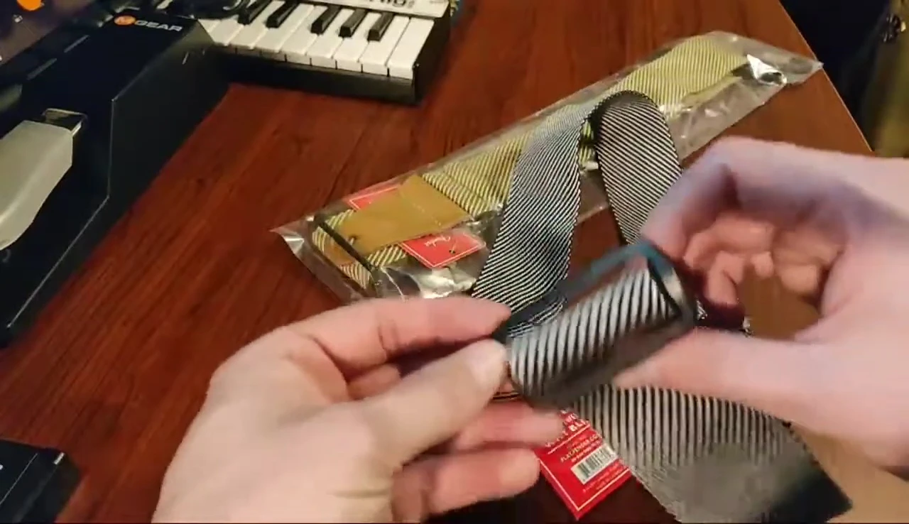 The plastic end of the Modern Tweed strap
