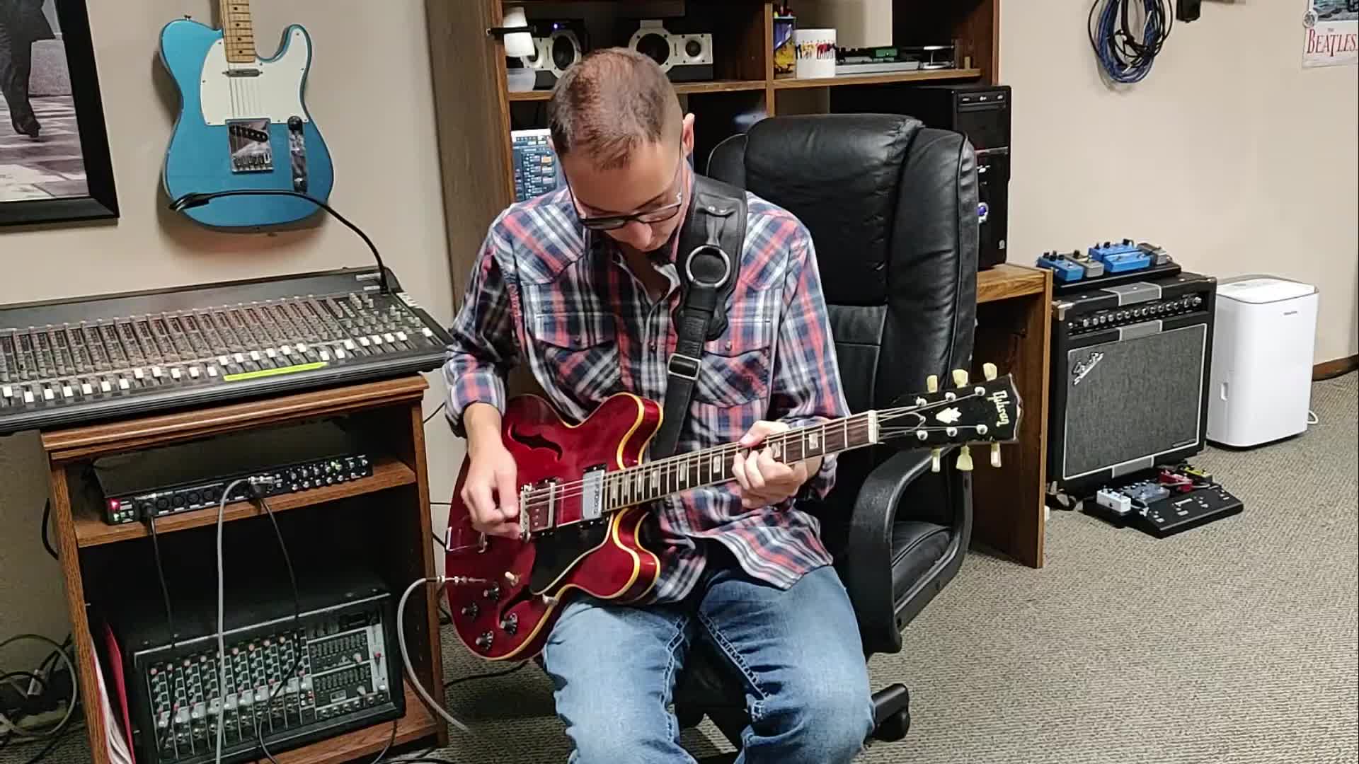 Close-up of the Franklin guitar strap packaging