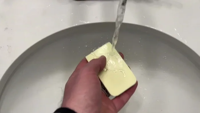 Wipe off any excess water and snap the lid closed.