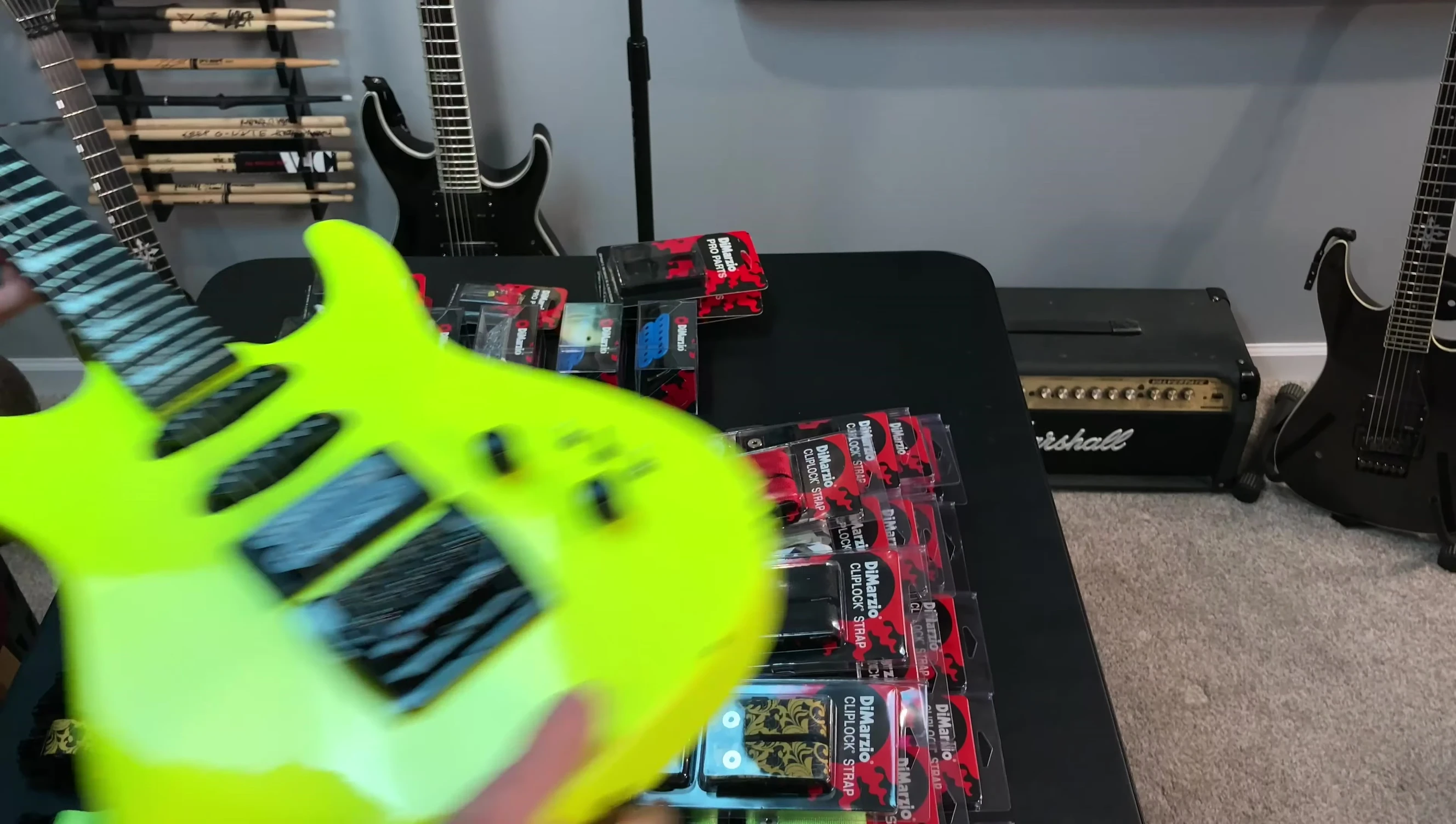 Tanara guitar with neon green strap