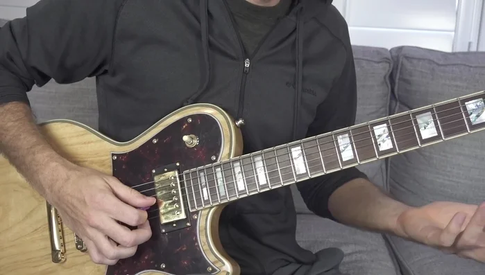 Practice getting a clean, individual tone from each fret before focusing on selective picking; this helps isolate the desired string.