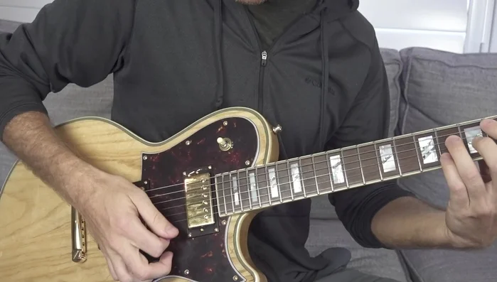 Develop dynamic chord playing by breaking chords into smaller, individual string articulations. This builds both picking and fretting hand coordination.