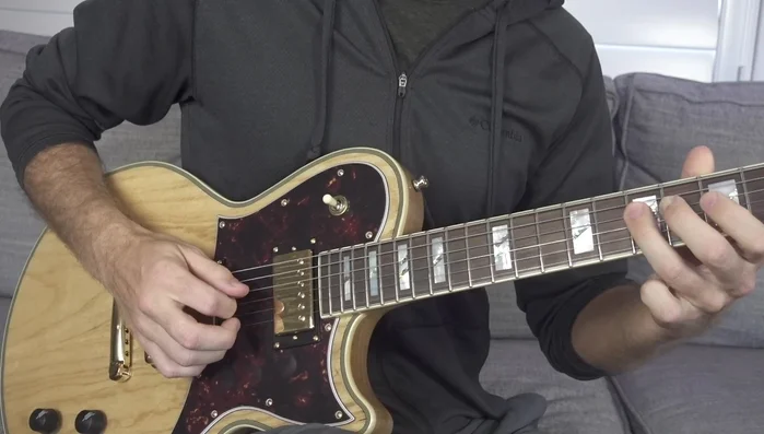 Practice single-string picking, initially focusing on downstrokes, then incorporating alternate picking.