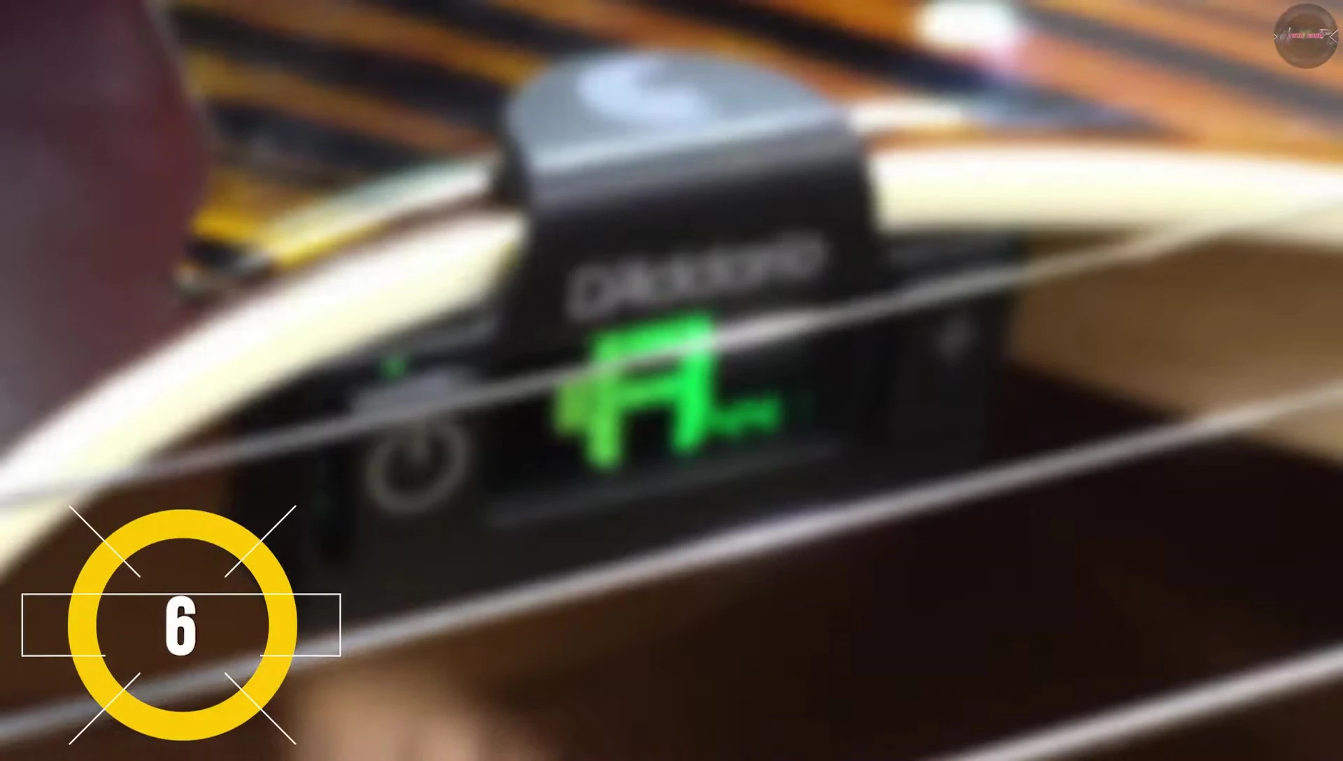 Dario NS Micro Sound Hole Tuner mounted inside a guitar's sound hole