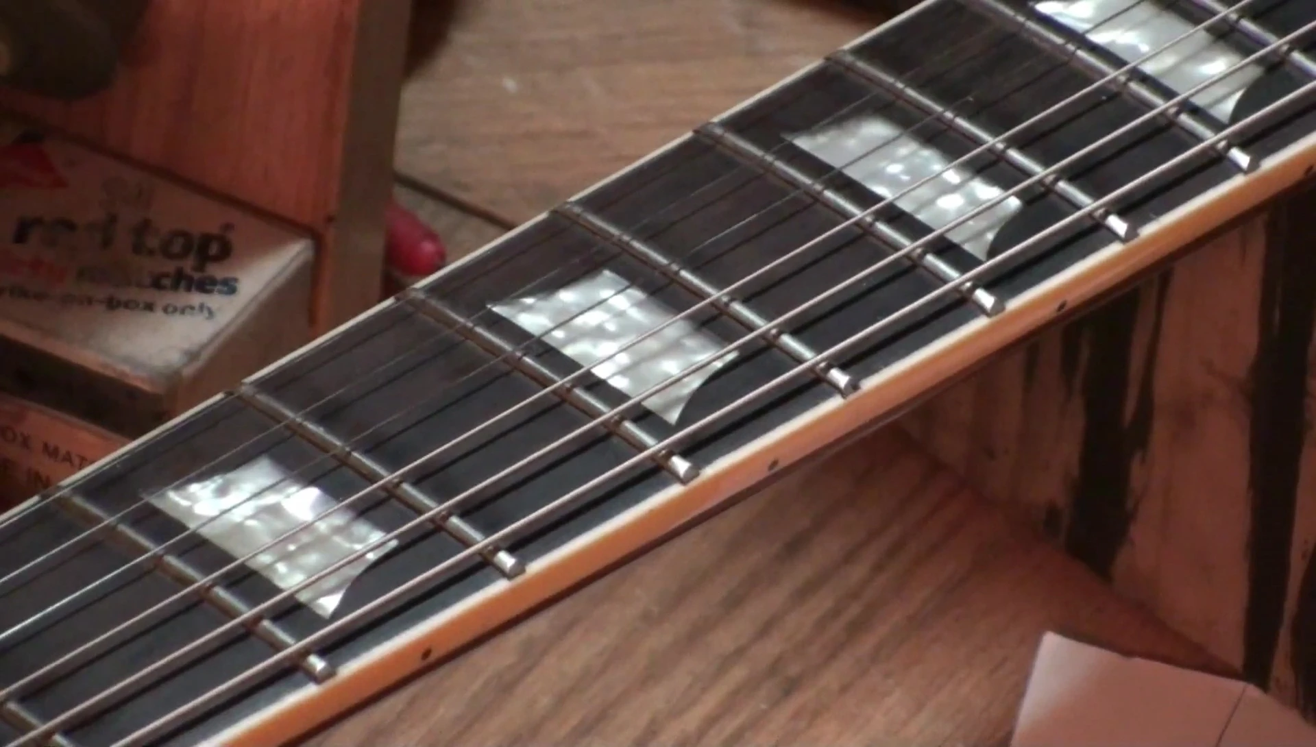 Close up of an adjustable capo.