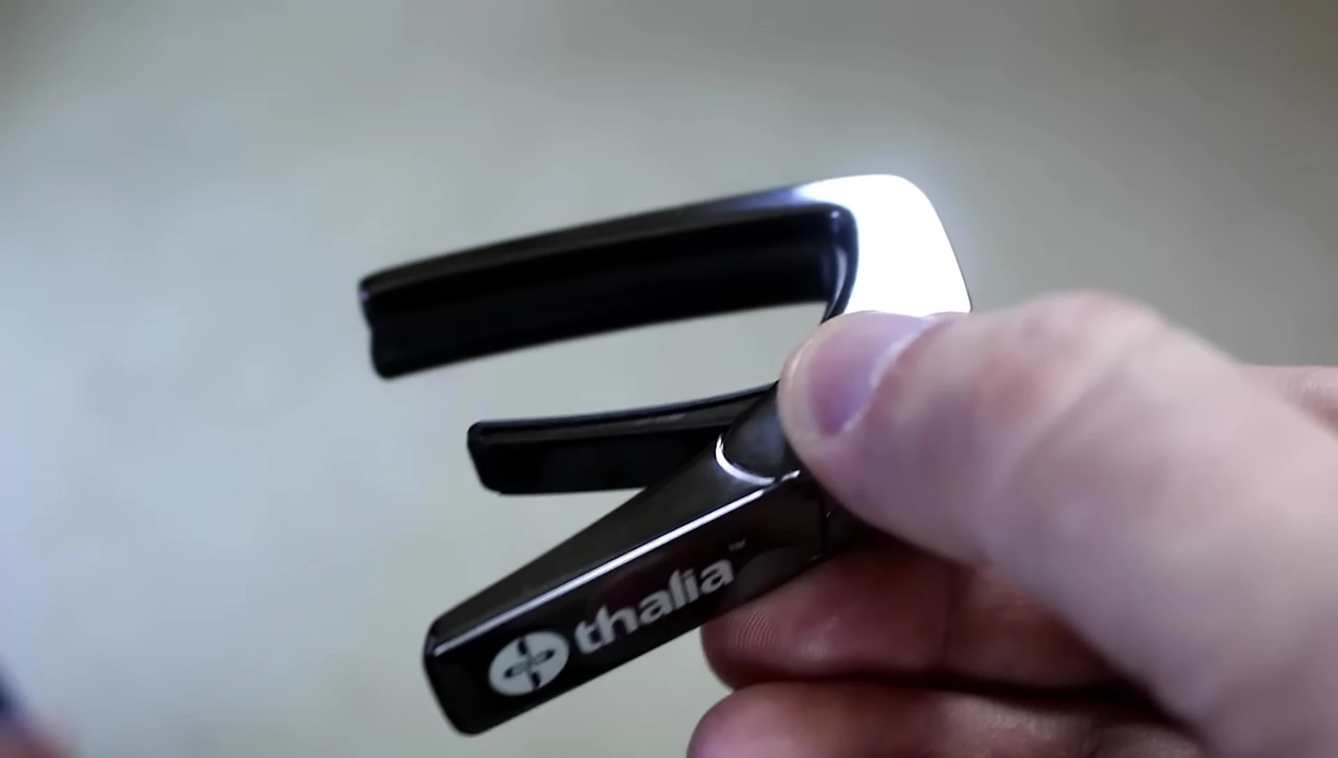 Close-up demonstrating the removable piece for neck customization