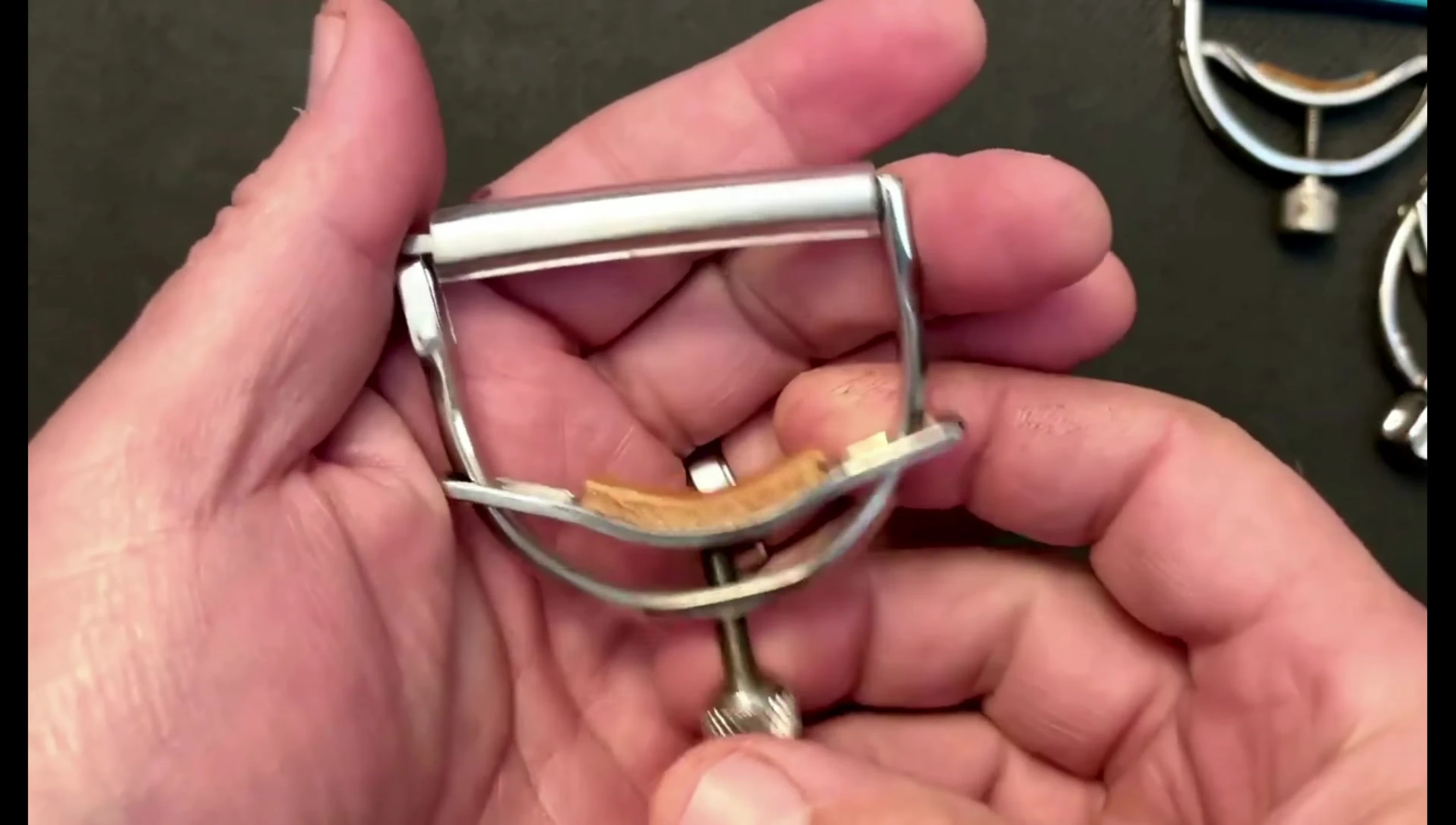 The Barry Collins capo is presented