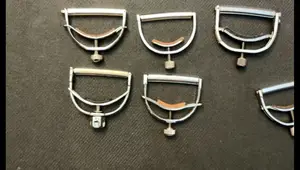 Yoke Style Capos: A Comprehensive Comparison of Elliott, Barry Collins, Shubb, & Paige