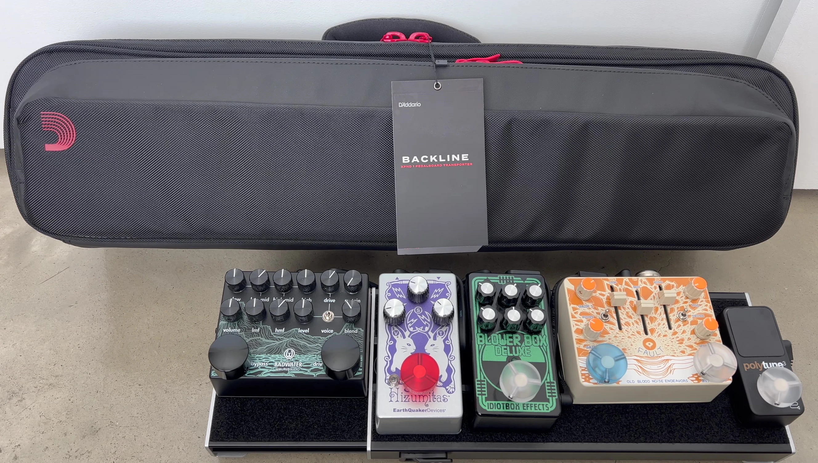 The D'Addario XPND 1 pedalboard and the Backline Transporter case