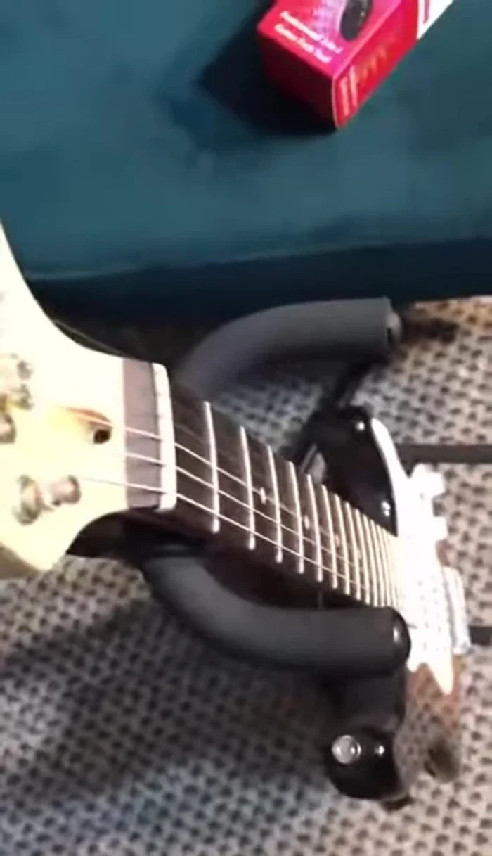 Once strings are somewhat in place, use a tuner to fine-tune the pitch by hand