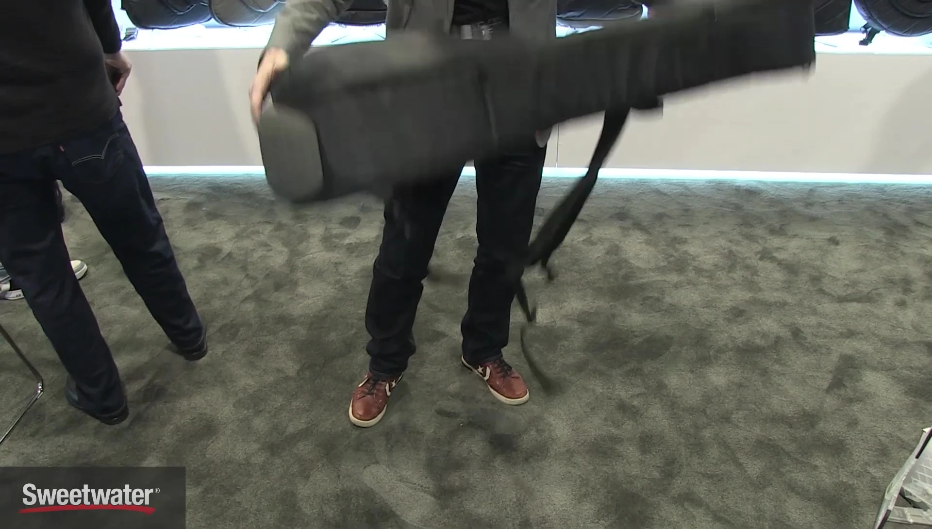 Demonstration of the case's ability to protect the guitar from drops.