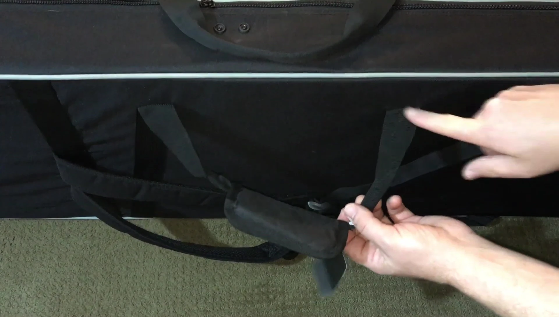 The sewn handles on the case