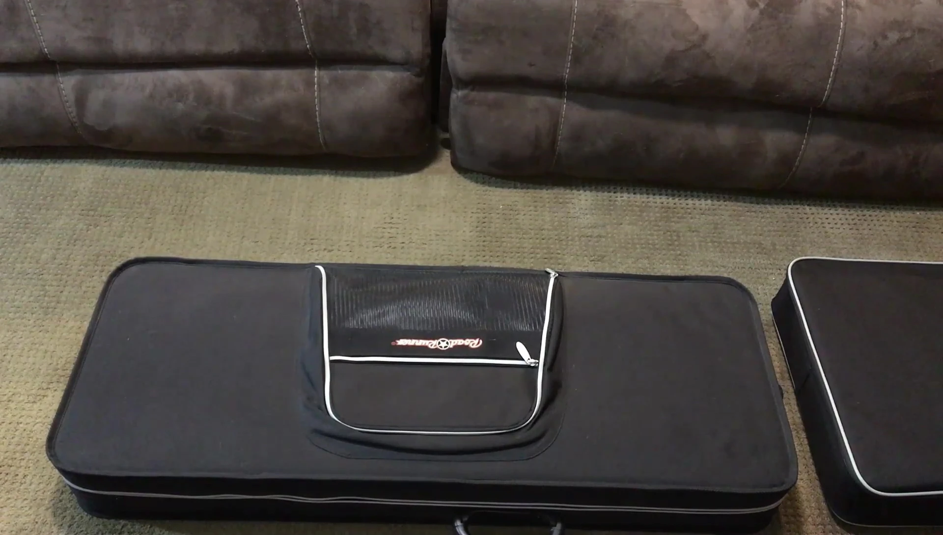 Comparison shot of the Epiphone and RoadRunner cases