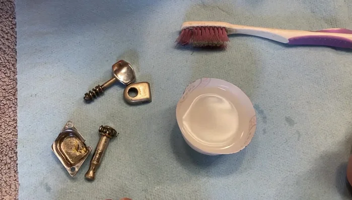 Clean the tuner cover with a toothbrush or Q-tip to remove any dried residue.