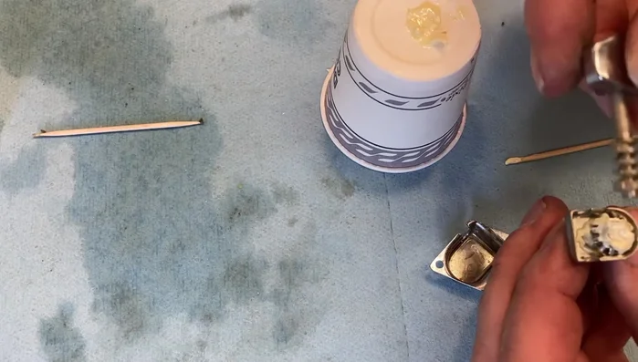 Reinstall the tuner and tighten the screws gently.