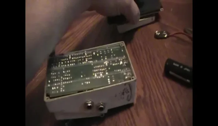 Remove the AC plugs by prying and pulling.