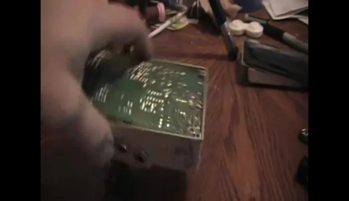 Remove the AC plugs by prying and pulling.