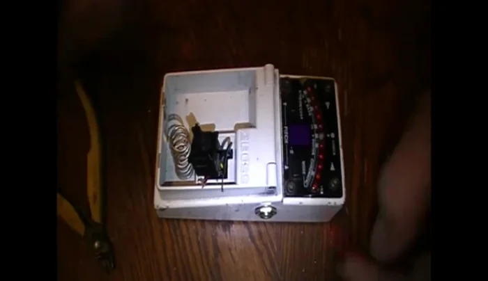 Strip the wires of the old battery plug and the replacement wires.