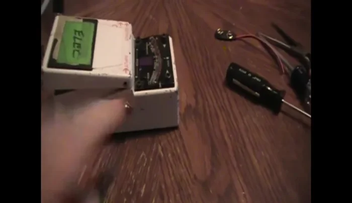 Remove the AC plugs by prying and pulling.