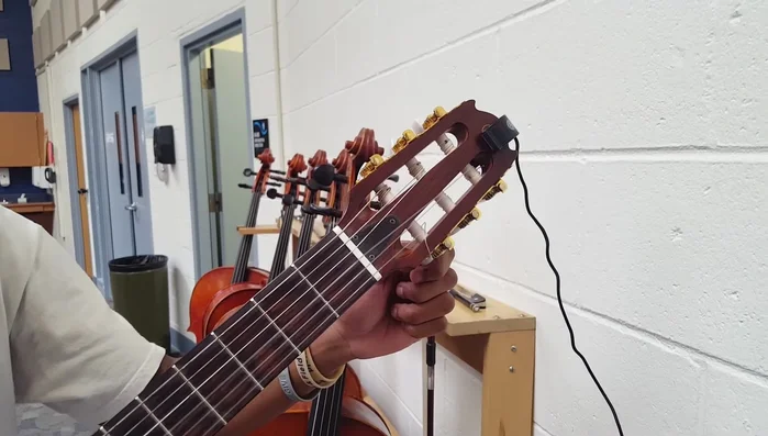 Turn the tuning key counterclockwise to raise the pitch, and clockwise to lower it.