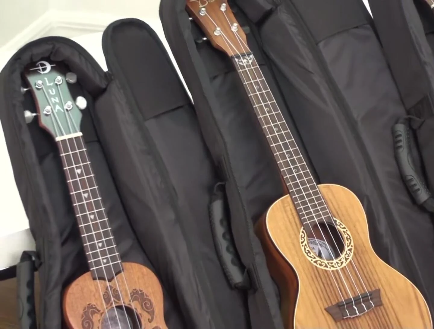 Close-up of ukulele gig bag sizes.