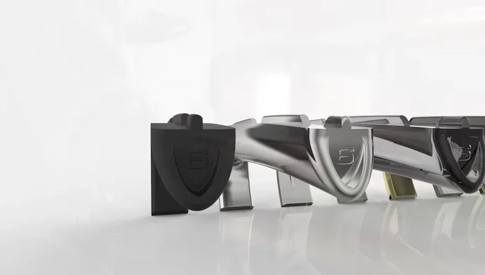 Testing and Development: Over 20 different fret pad materials were tested to find the optimal material for consistent pressure and tuning across various guitar fretboard radii.