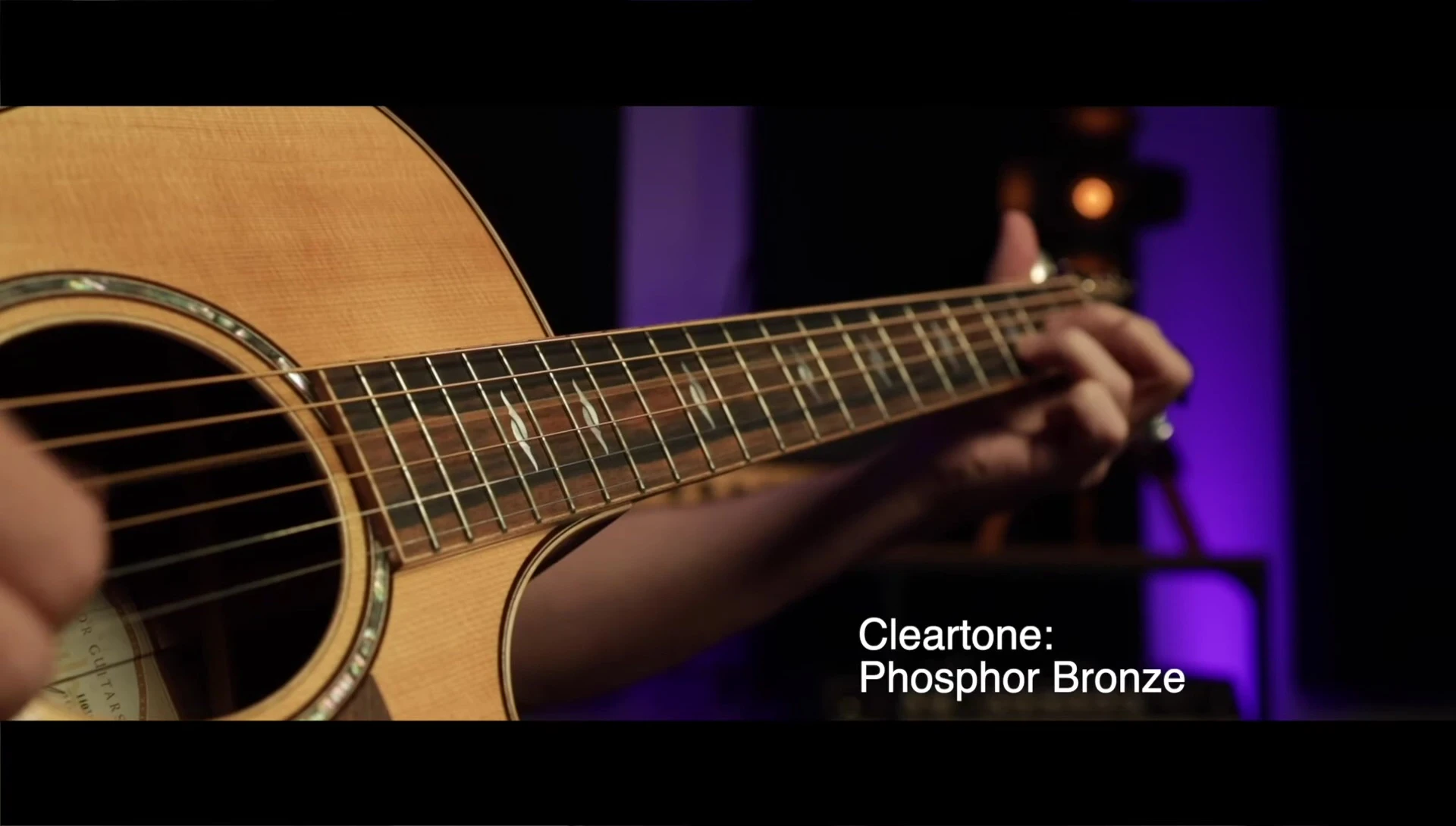 Shot of the reviewer holding both the Cleartone and Elixir packaging.