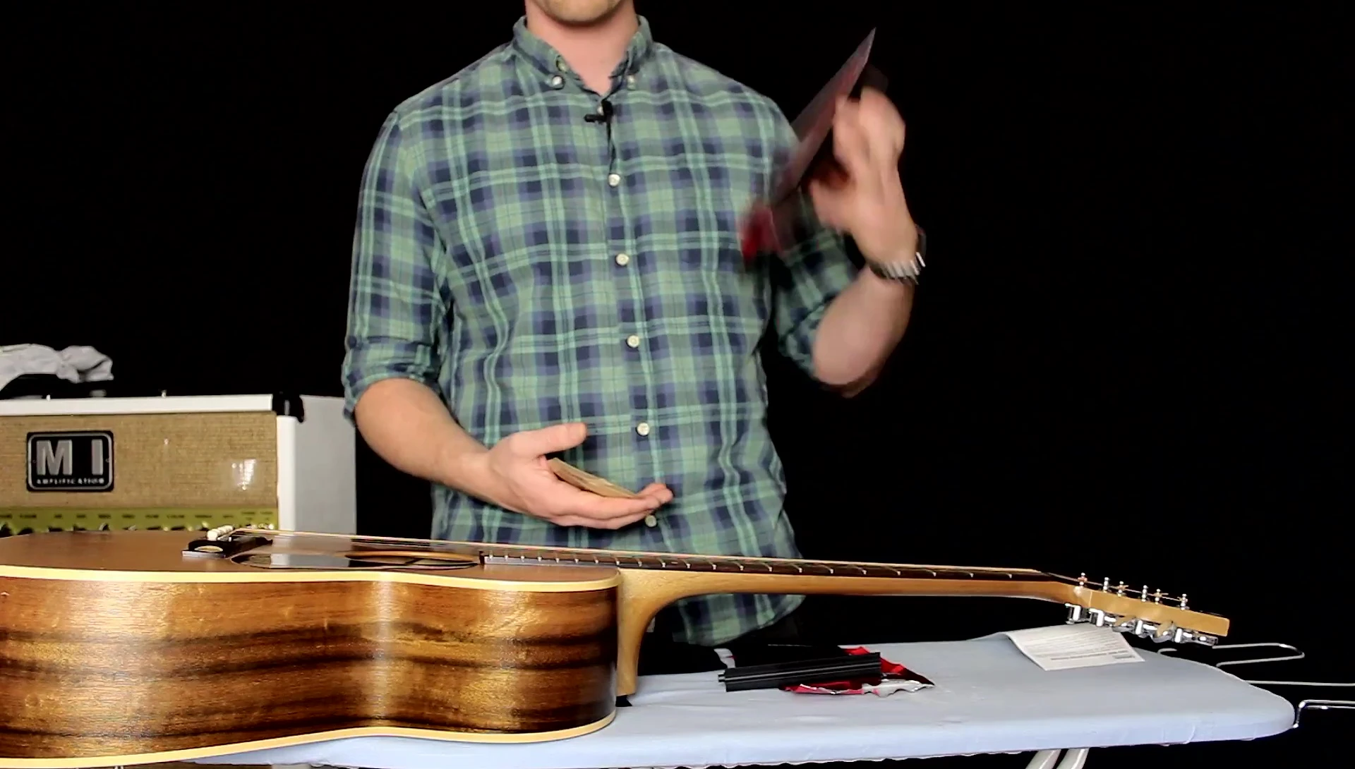 Close-up of the Planet Waves 3-Way Humidifier pack box being opened, revealing the contents.