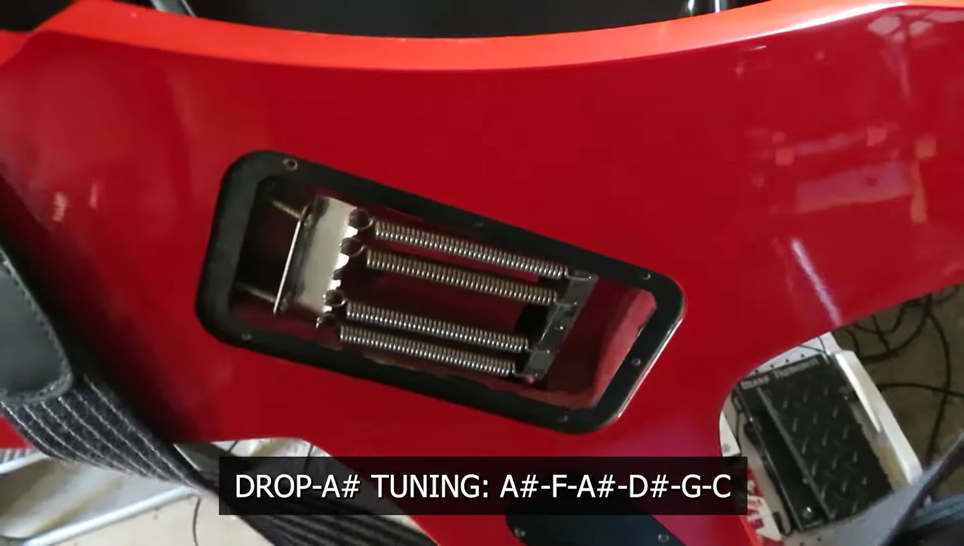Bridge adjustments for drop A tuning.