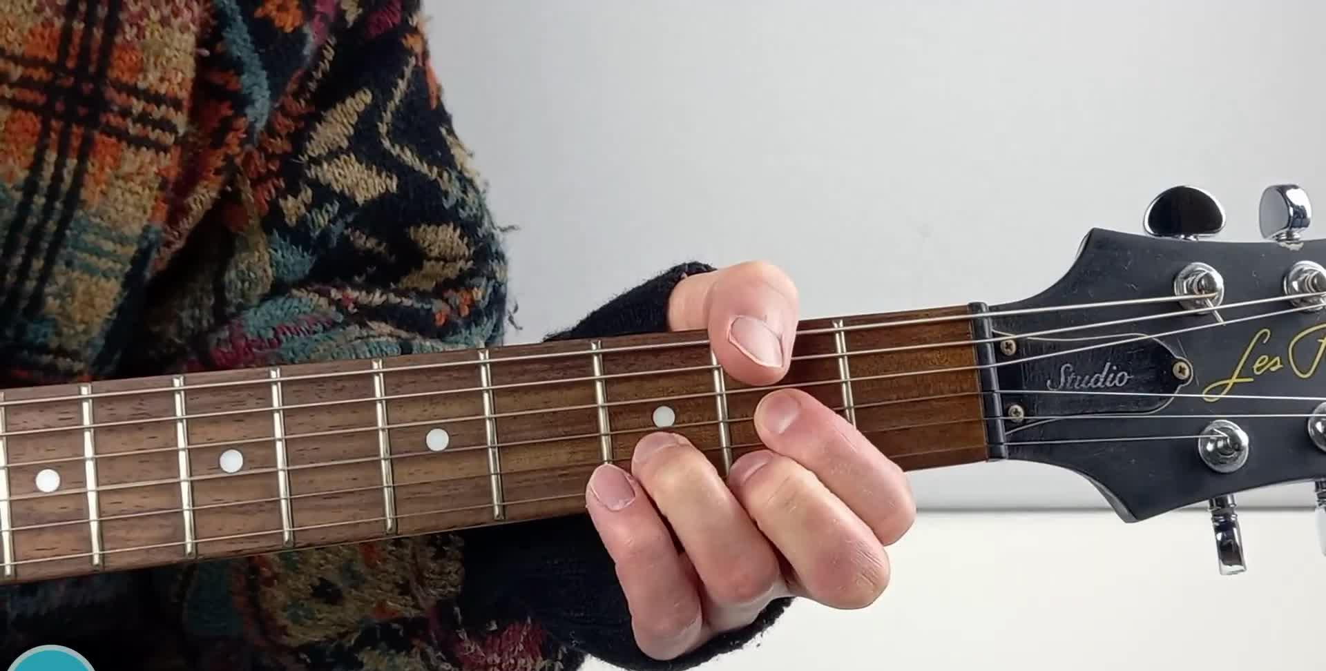 Image showing a guitar with loose, poorly tuned strings.