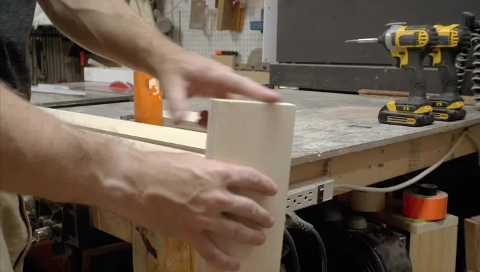 Cut the box in half using a table saw.