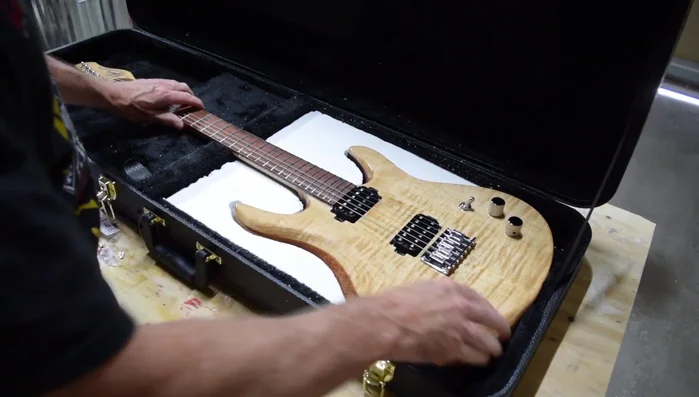 Test fit the guitar to confirm the foam insert holds the guitar securely and prevents movement in any direction.