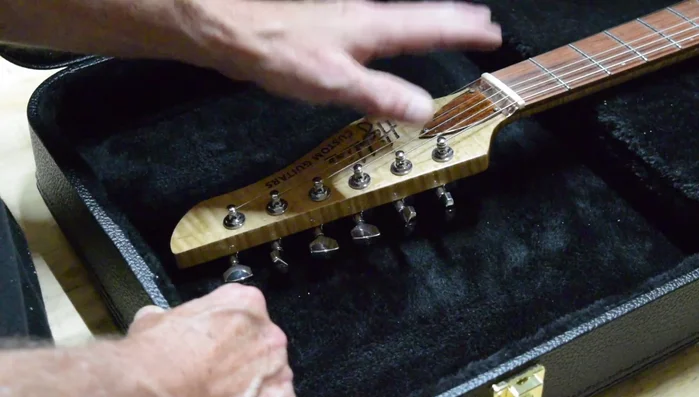 Wrap the headstock with a minimal amount of bubble wrap for cosmetic protection (avoid excessive wrapping to prevent impact transfer).