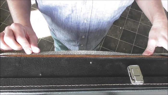 Prepare the damaged area. Gently push back the loose vinyl to prevent mixing with other parts.