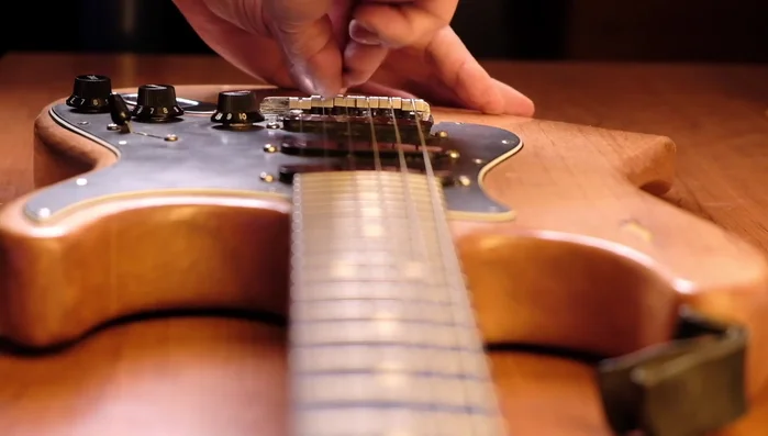 Adjust the saddles in small increments. The speaker recommends no more than a quarter or half turn at a time to avoid over-adjusting.