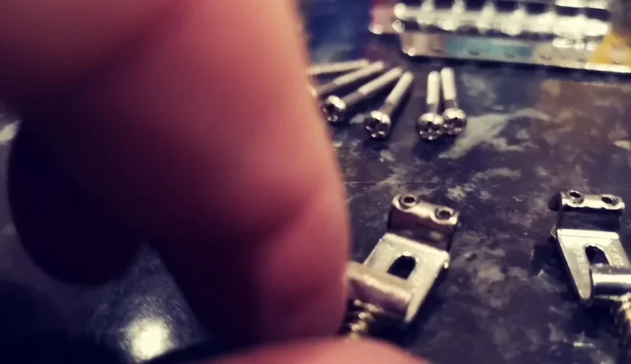 Use small files to smooth out any pitting or grooves left by the rust on the saddles.