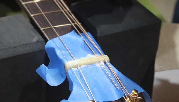 Apply super glue accelerator.