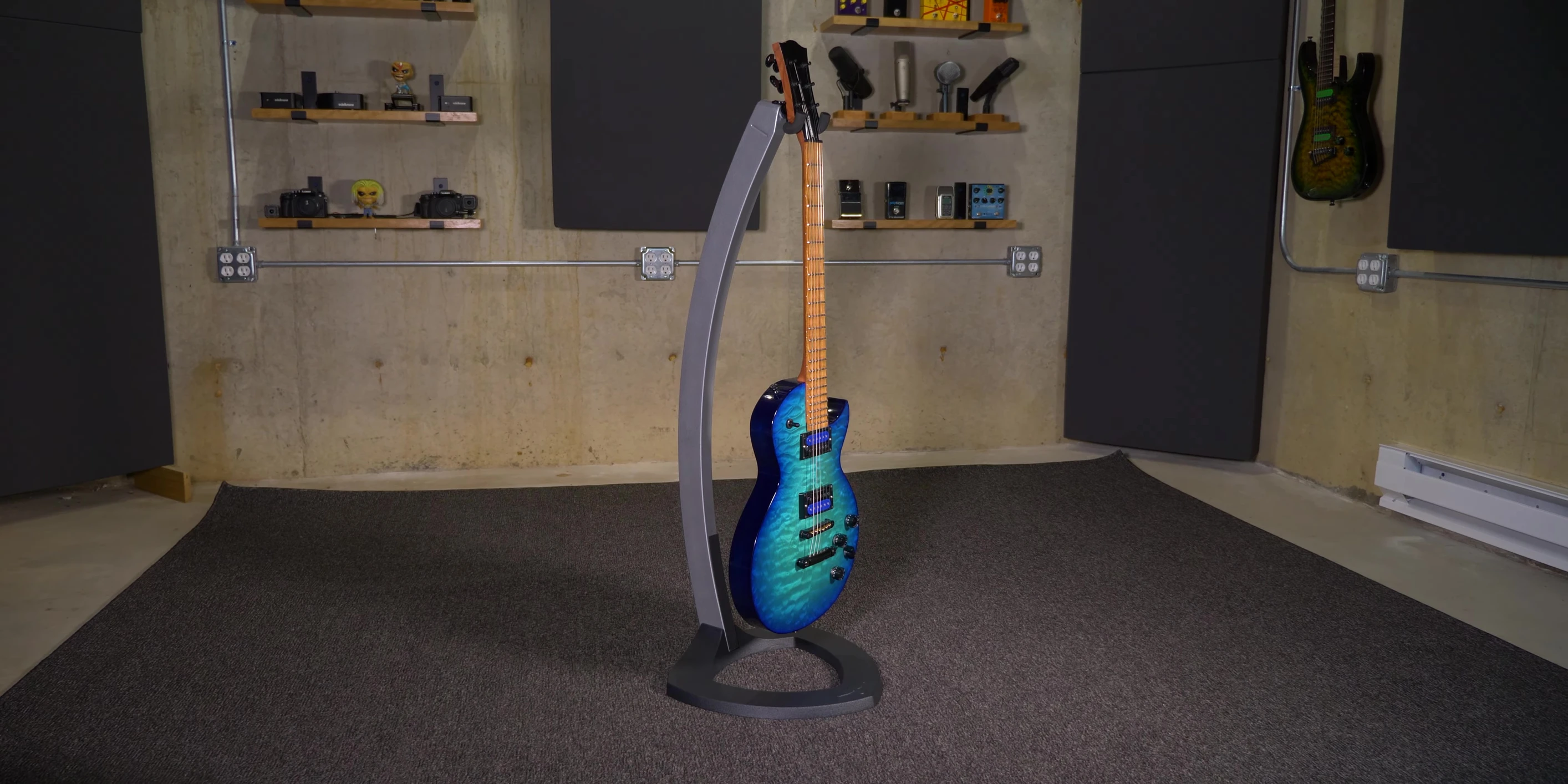 Various guitars displayed on the stand
