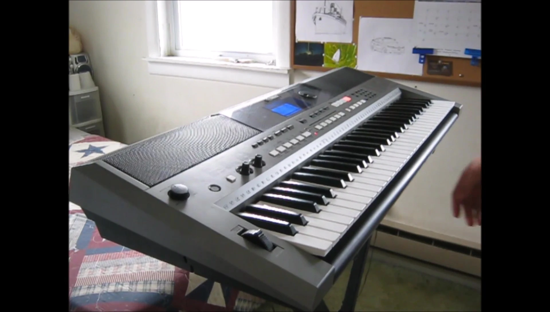Demonstrating the stand's stability with the keyboard placed.