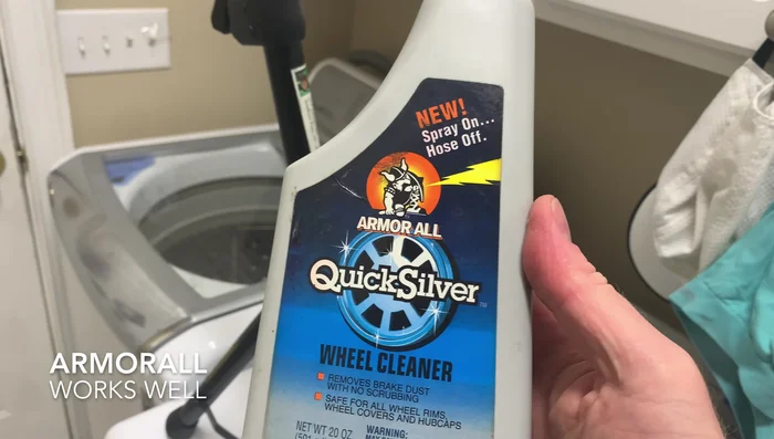 (Optional) Apply Armor All wheel cleaner to restore the plastic's black color.