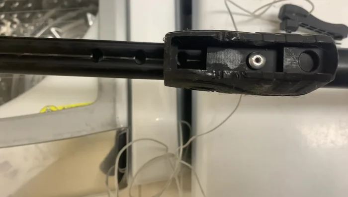 Wrap electrical tape around the wire to reinforce the knot and secure the wire in place.