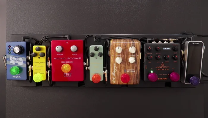 Apply EQ to shape your tone. Adjust the bass and treble frequencies to achieve a balanced and pleasing sound. The Optima Air pedal provides a three-band EQ.