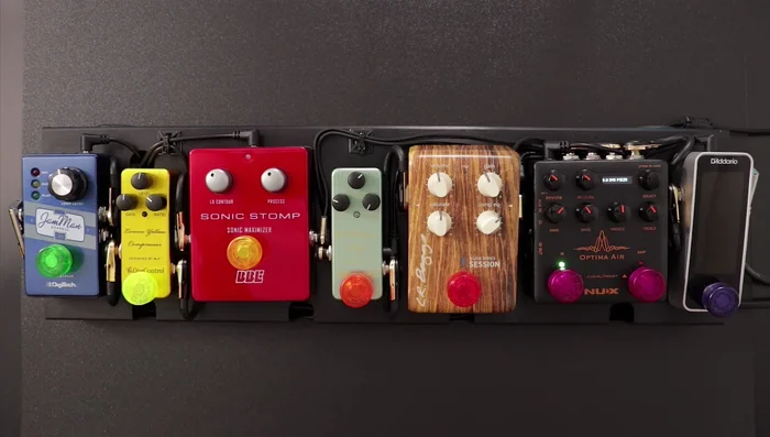 Apply EQ to shape your tone. Adjust the bass and treble frequencies to achieve a balanced and pleasing sound. The Optima Air pedal provides a three-band EQ.