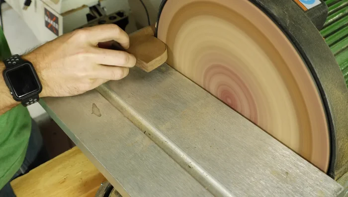 Flatten the base using a belt sander to provide a stable base.