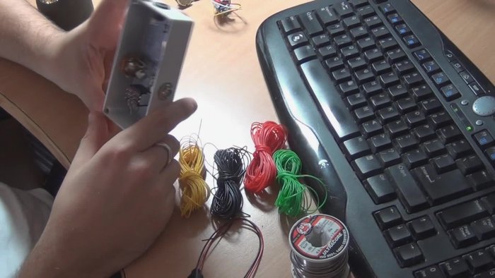 Prepare the enclosure: Paint or customize your enclosure and drill the necessary holes for components.